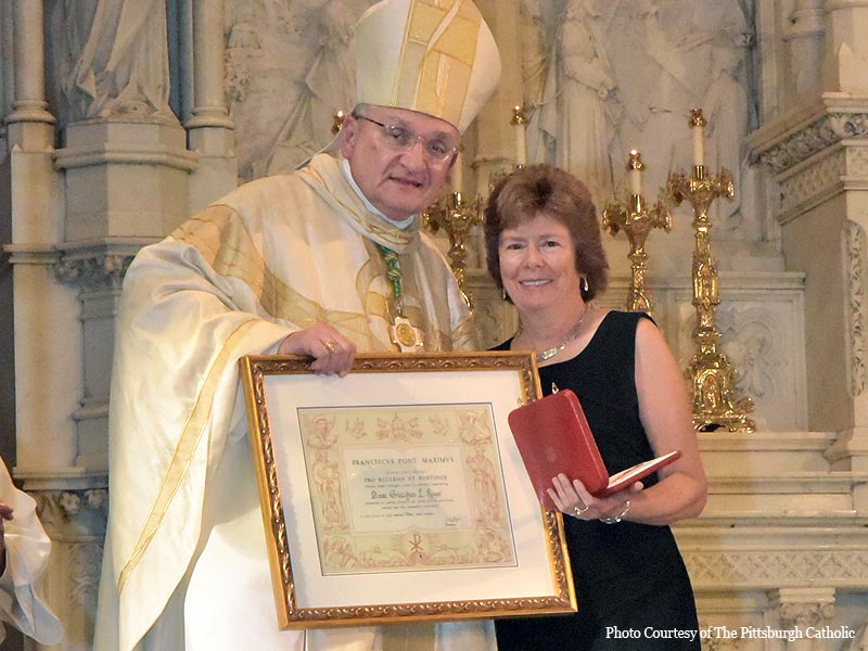 Chimbote Board Member Gretchen Roos Honored with Papal Cross