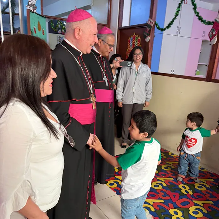 The Apostolic Nuncio with children at the facility