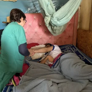 Ellie offering bedside care