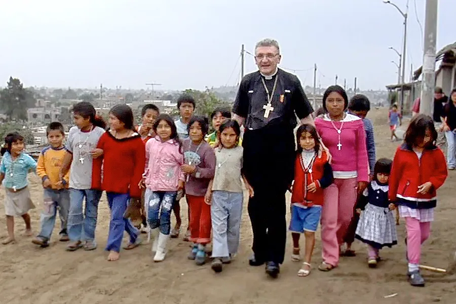 Bishop David Zubik walking with the children of Chimbote