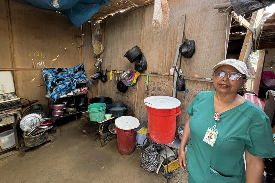 Zoraida Mezones Sánchez standing inside a Chimbote home